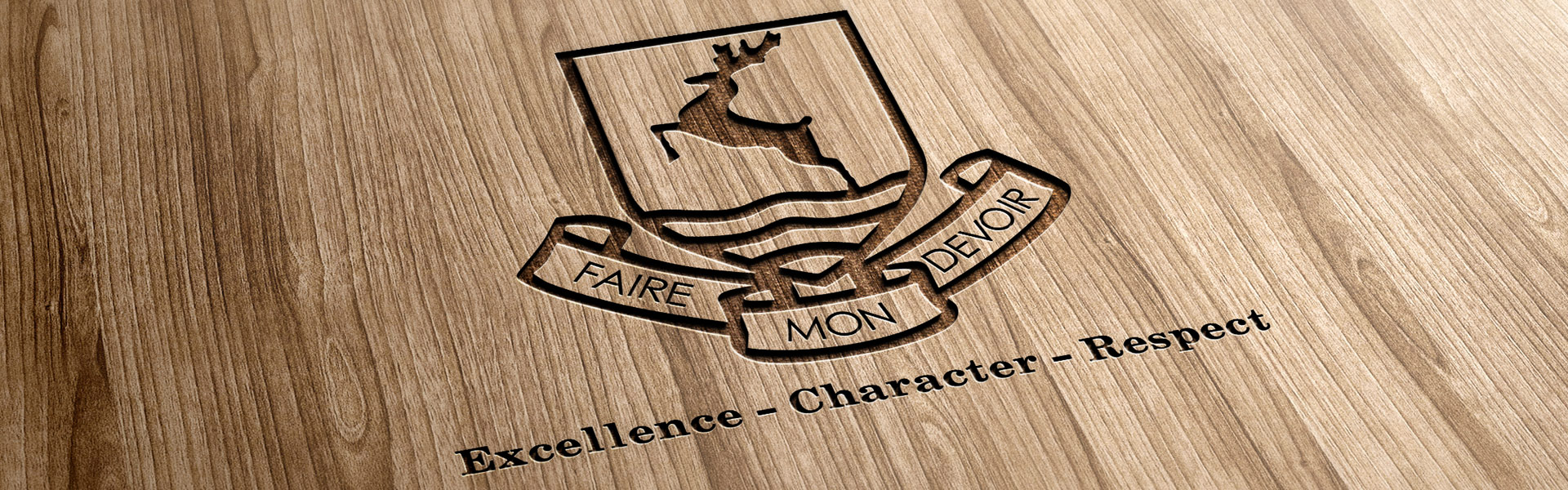 school logo and strapline laser-etched into wood