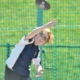 young student hurls discus
