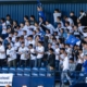 football supporters cheer on school team